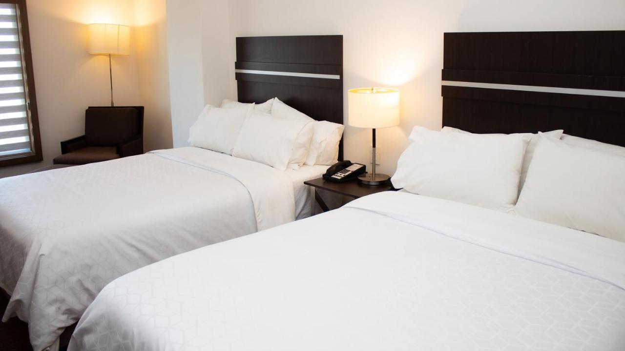 Holiday Inn Express Guaymas By Ihg Exterior photo A typical room at the Hilton Garden Inn